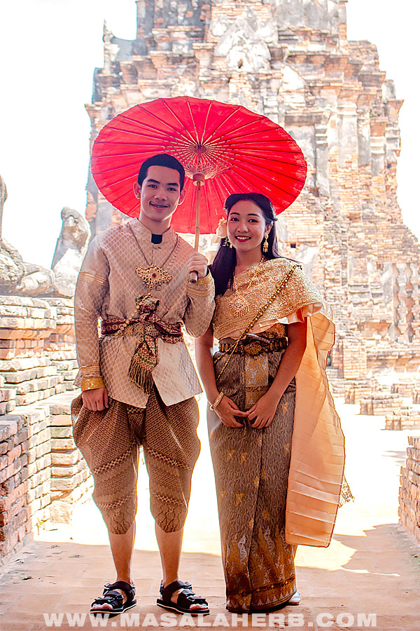 Thai couple dressed in traditional clothes