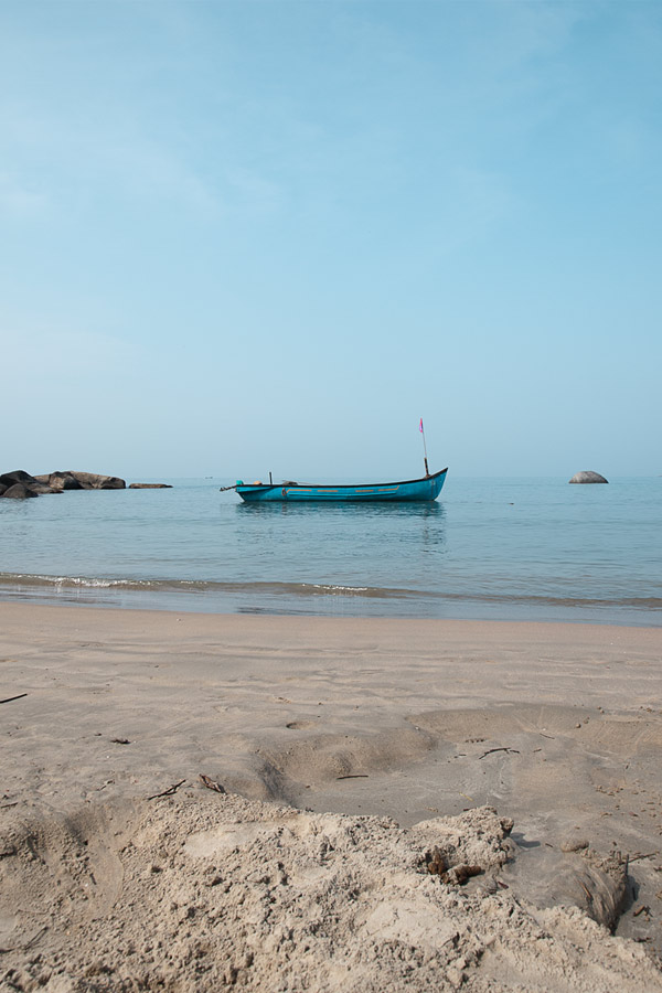 palolem beach with boat