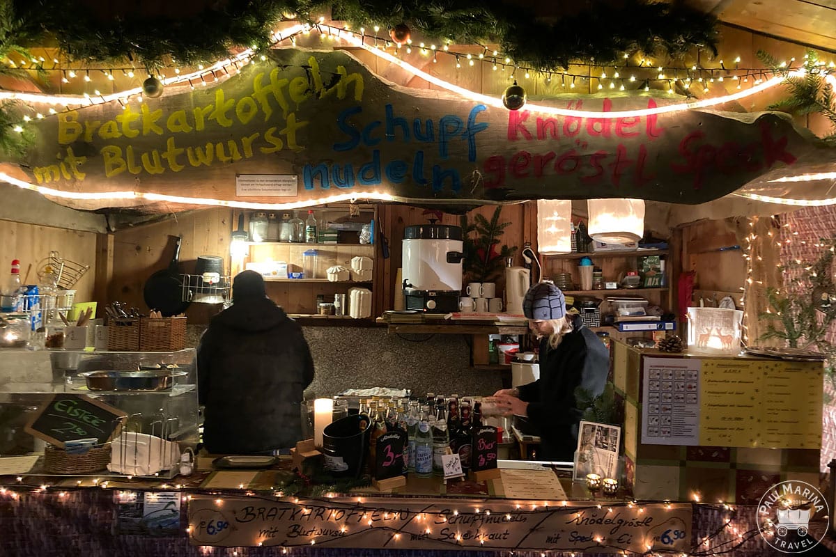 A shop selling baked potatoes with blood sausage