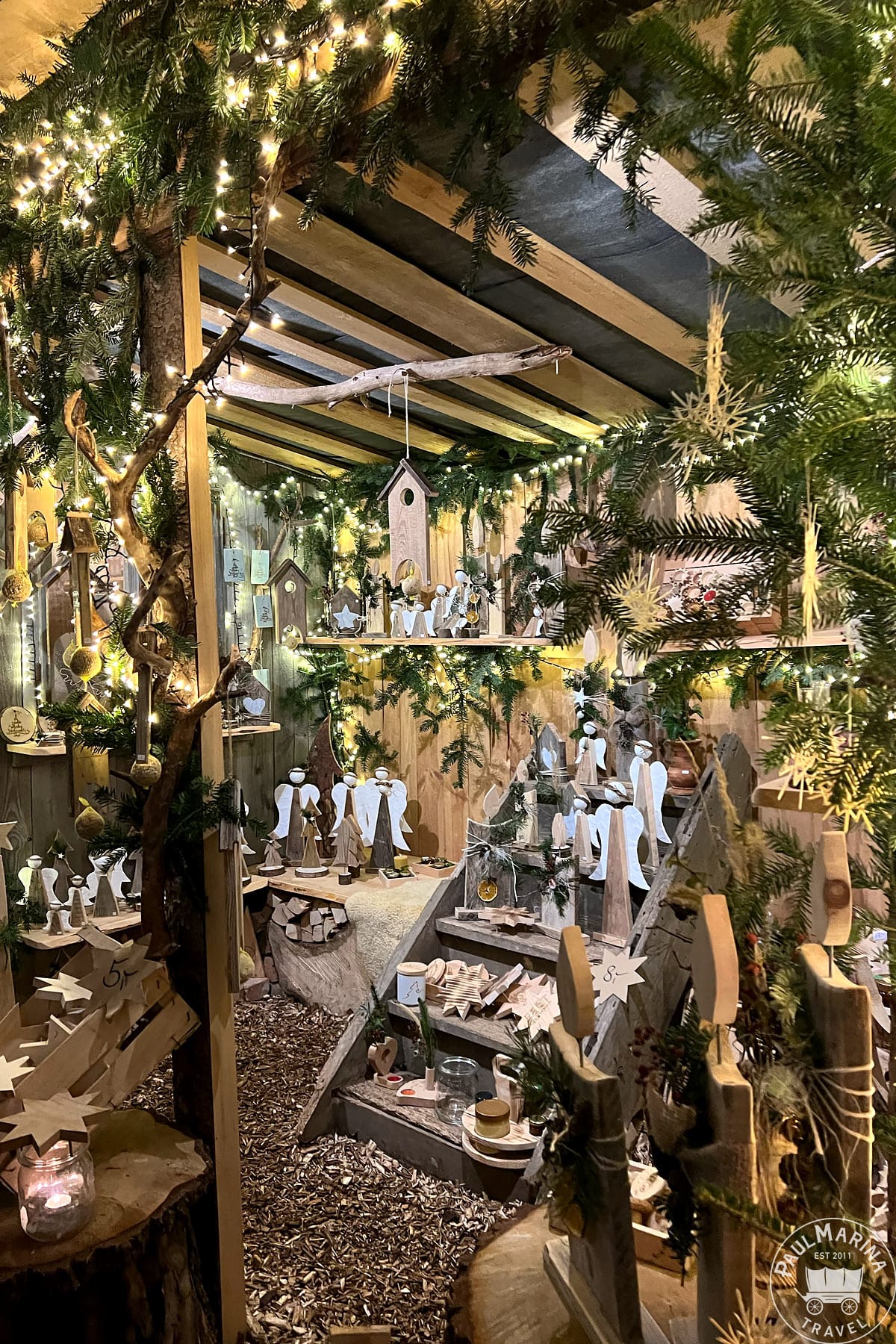 A stall selling wooden Christmas decorations